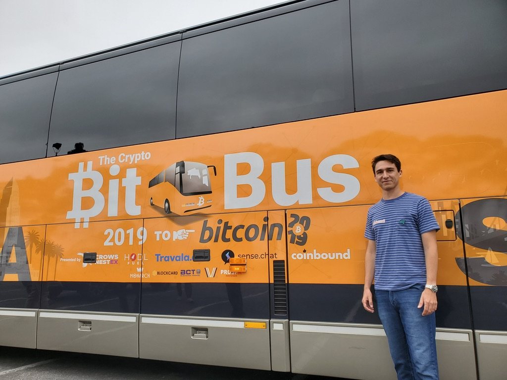 Ty Smith in front of the Crypto BitBus, sponsored by Coinbound, 2019