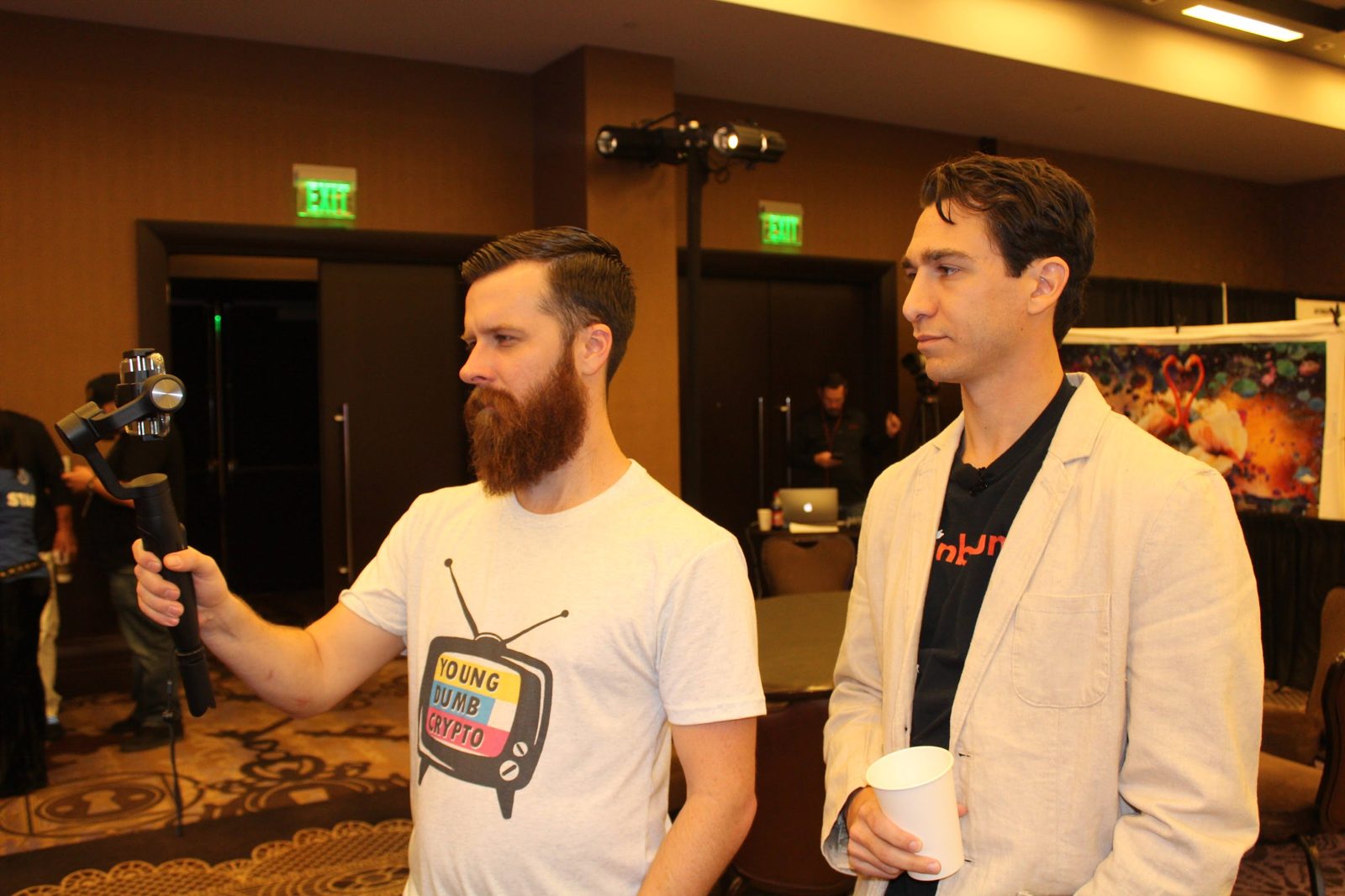 Coinbound interviewing a guest at a crypto event