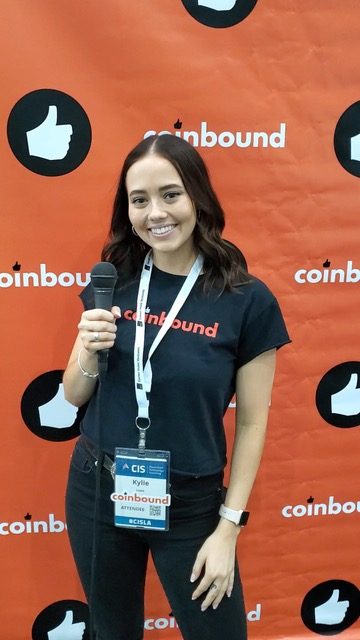 A Coinbound team member hosting interviews at a conference